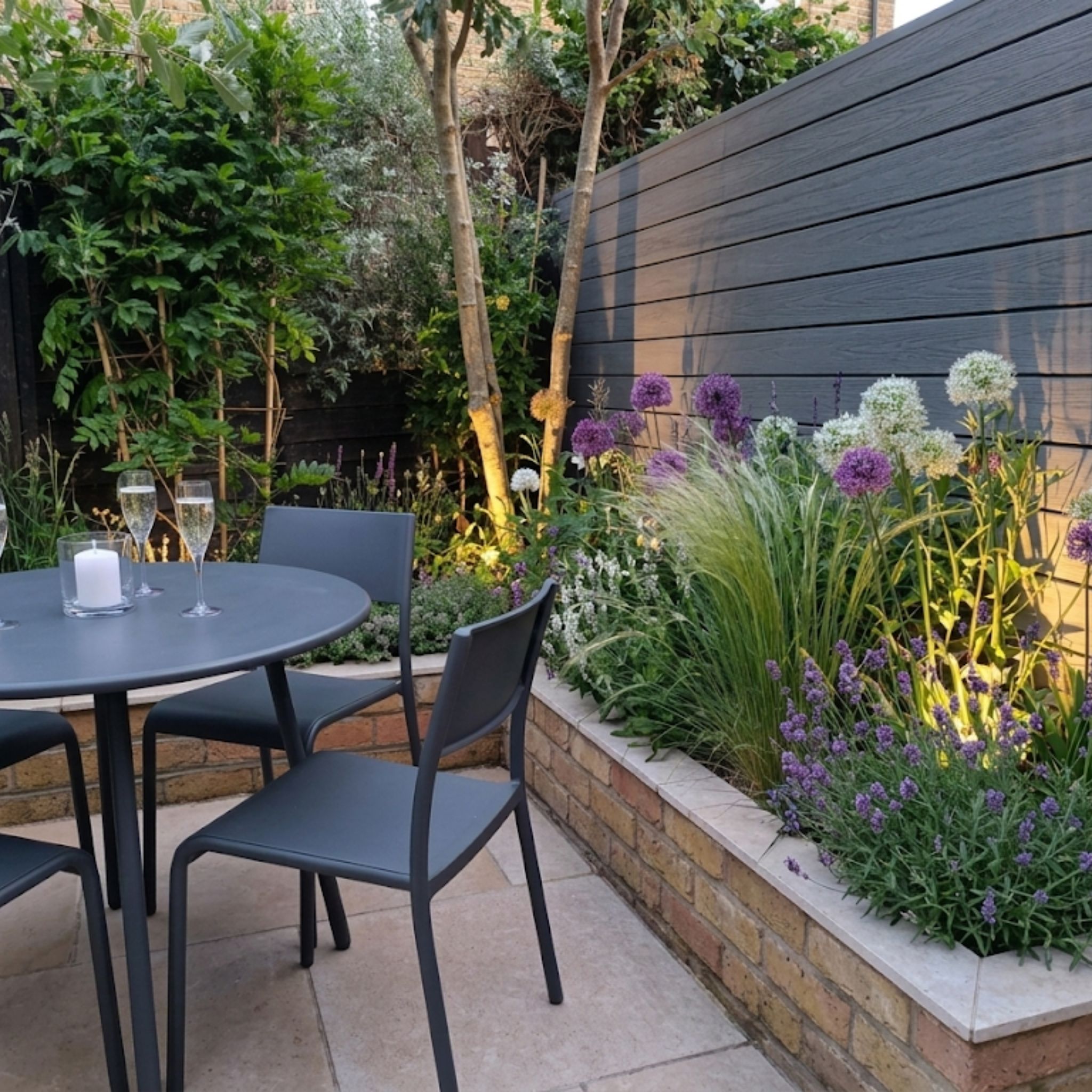 Courtyard with alliums and lighting